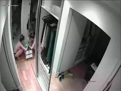 A slender lady is seen stroking her hot cunt on a camera concealed in the apartment.